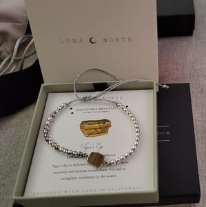 Silver pull string bracelet